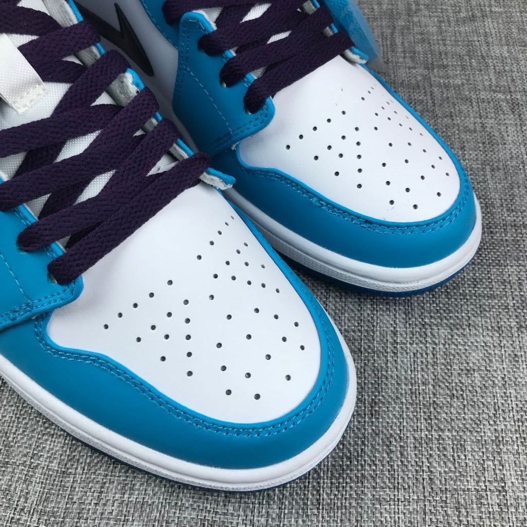 Air Jordan 1 Mid Sneakers in Blue, in White and Black - product image from the listing.