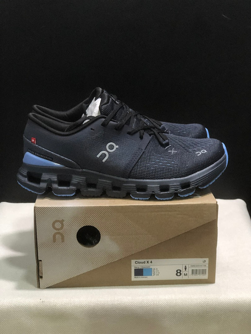 On Cloud X 4 Running Sneakers in Navy - product image from the listing.