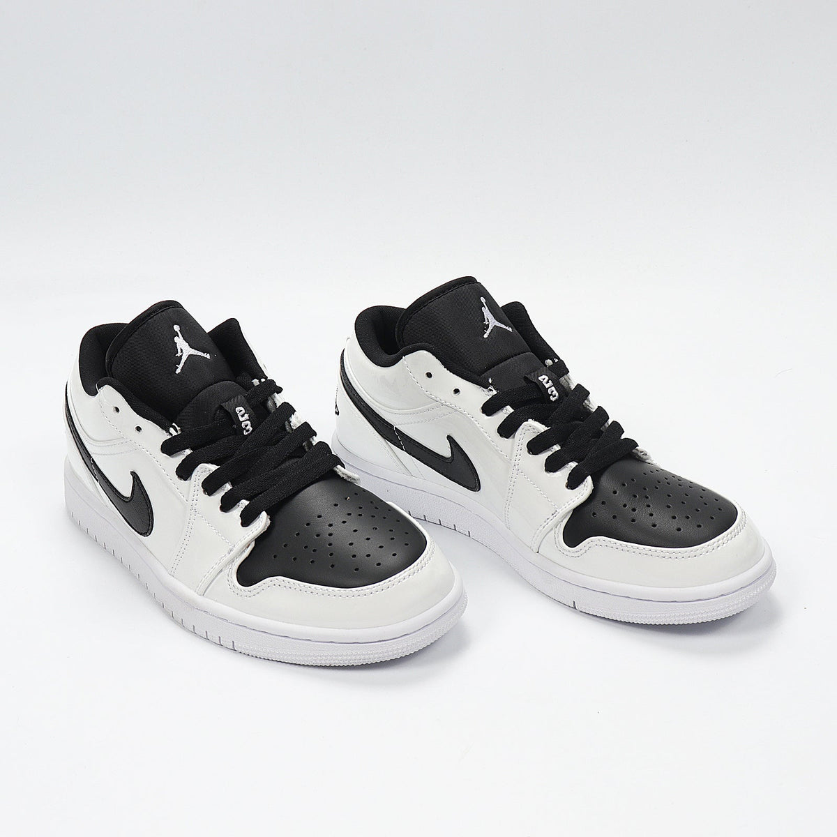 Air Jordan 1 Low Panda Black White Sneakers 553560-103 - product image from the listing.