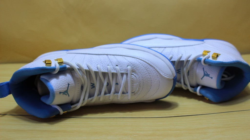 Air Jordan 12 High-Top Sneakers in University Blue 510815-127 - product image from the listing.