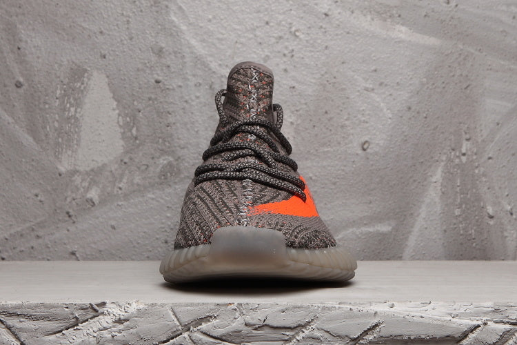 Charcoal and Bright Orange Yeezy 350 V2 Sneakers - product image from the listing.