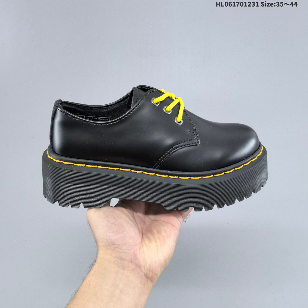 Black Dr. Martens 1460 Platform Lace-Up Boots - product image from the listing.