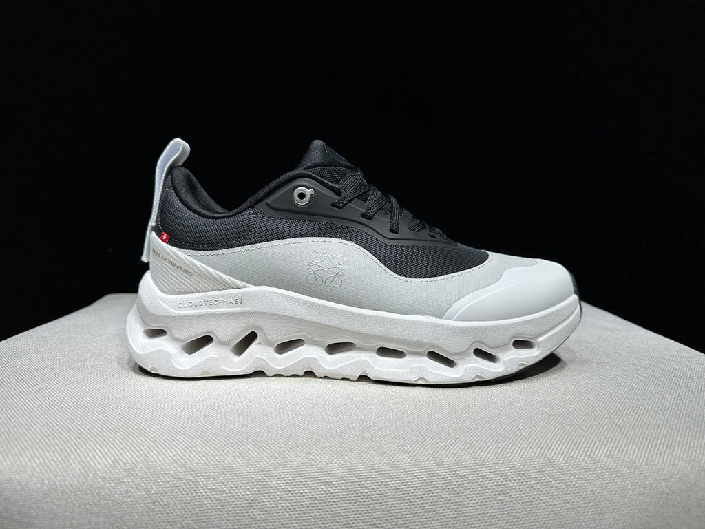 On Cloudtilt 2.0 Sneakers in White and Black - product image from the listing.