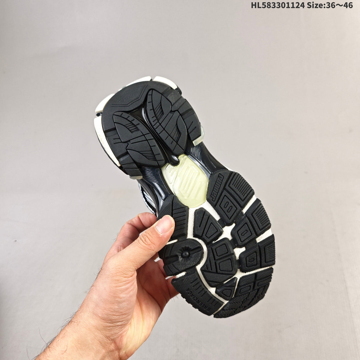 Black and White Balenciaga Runner Low-Top Sneakers - product image from the listing.