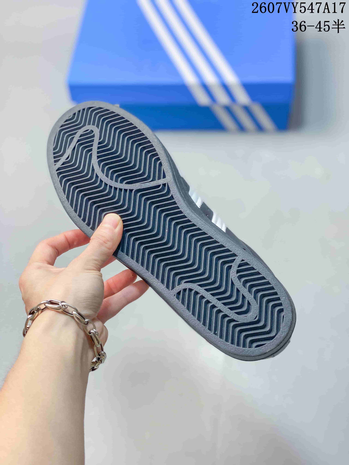 Adidas Originals Superstar Sneakers in Black and White - product image from the listing.