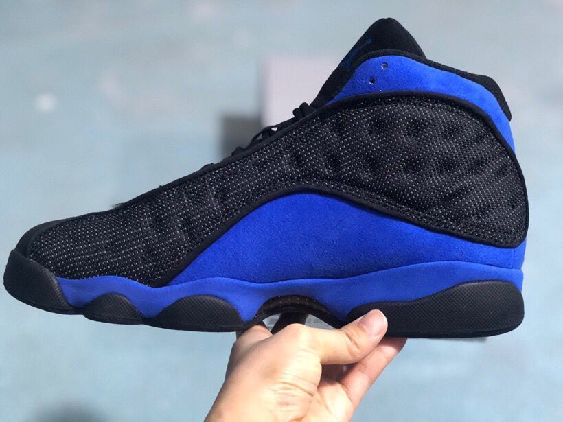Jordan 13 Retro Sneakers Black/Royal in Blue - product image from the listing.