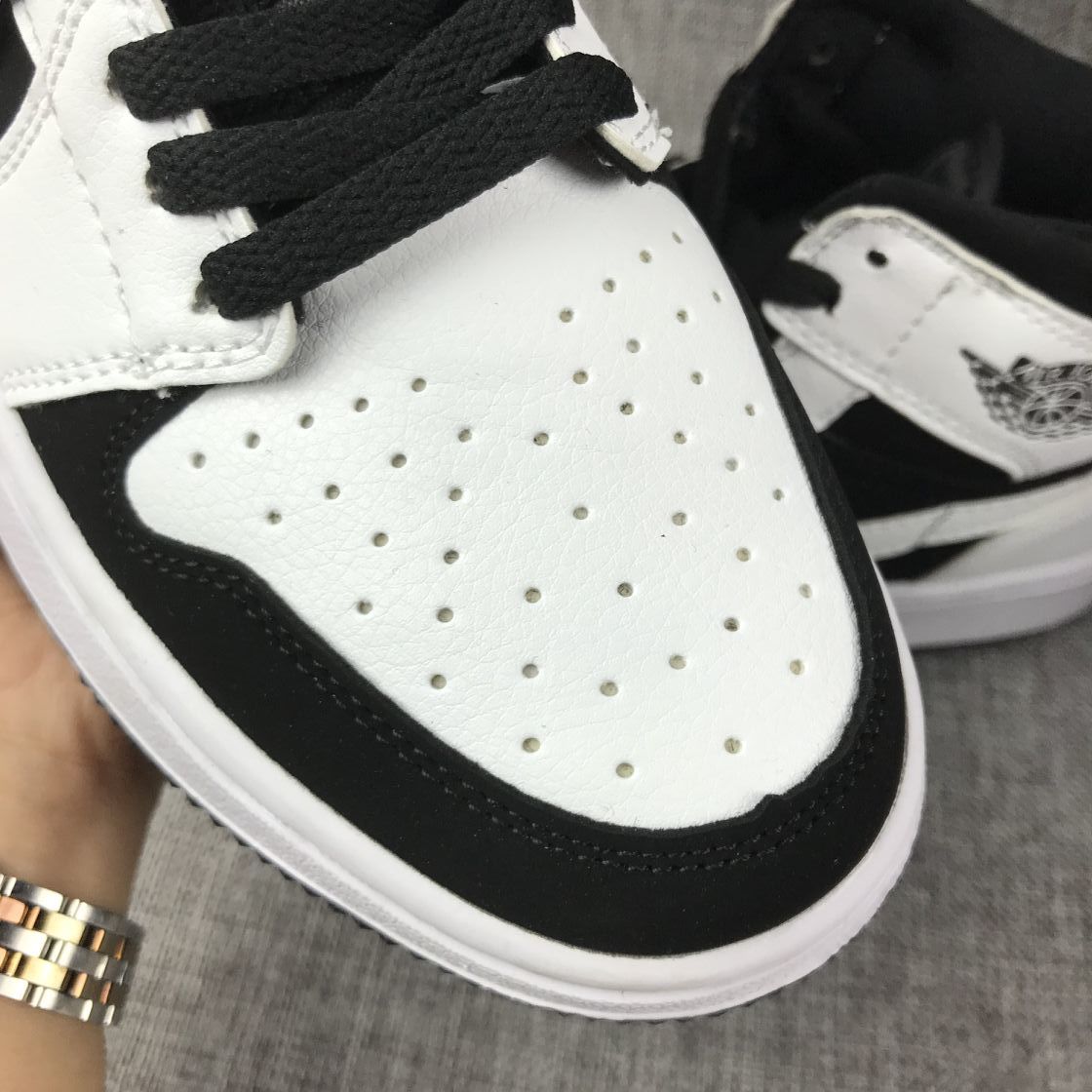 Air Jordan 1 Mid Black White Sneakers 554724-113 - product image from the listing.