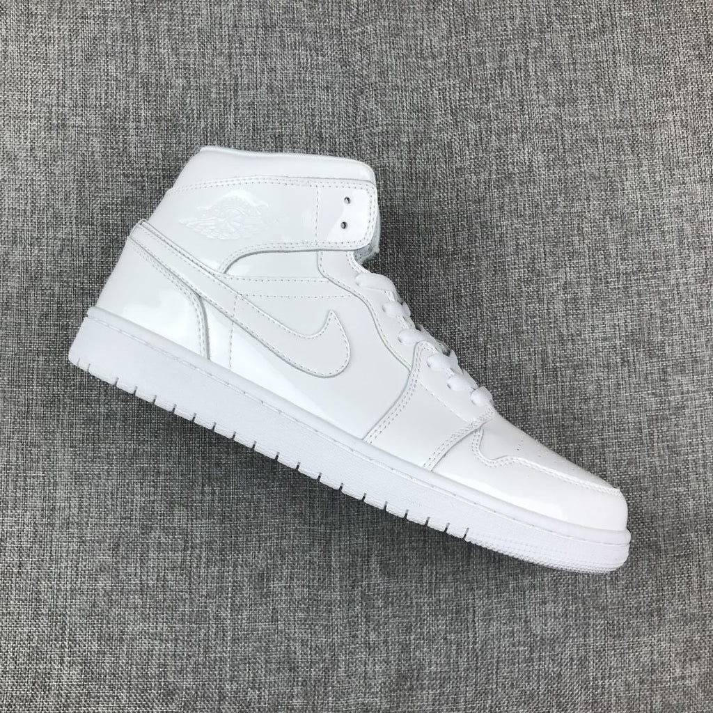 Air Jordan 1 Mid White Patent-Style Sneakers BQ6472-111 - product image from the listing.