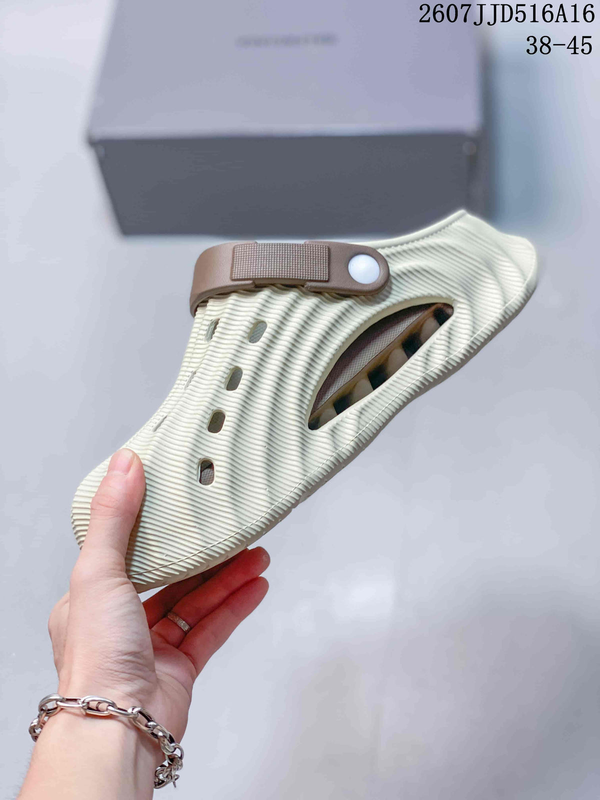 Balenciaga Molded Clog Slides in Cream Brown 2607JJD516A16 - product image from the listing.