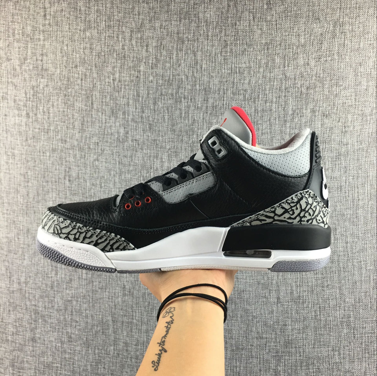 Black Cement Sneakers - Air Jordan 3 Retro - product image from the listing.