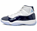 Jordan 11 Retro High-Top Sneakers in White and Navy Blue - product image from the listing.