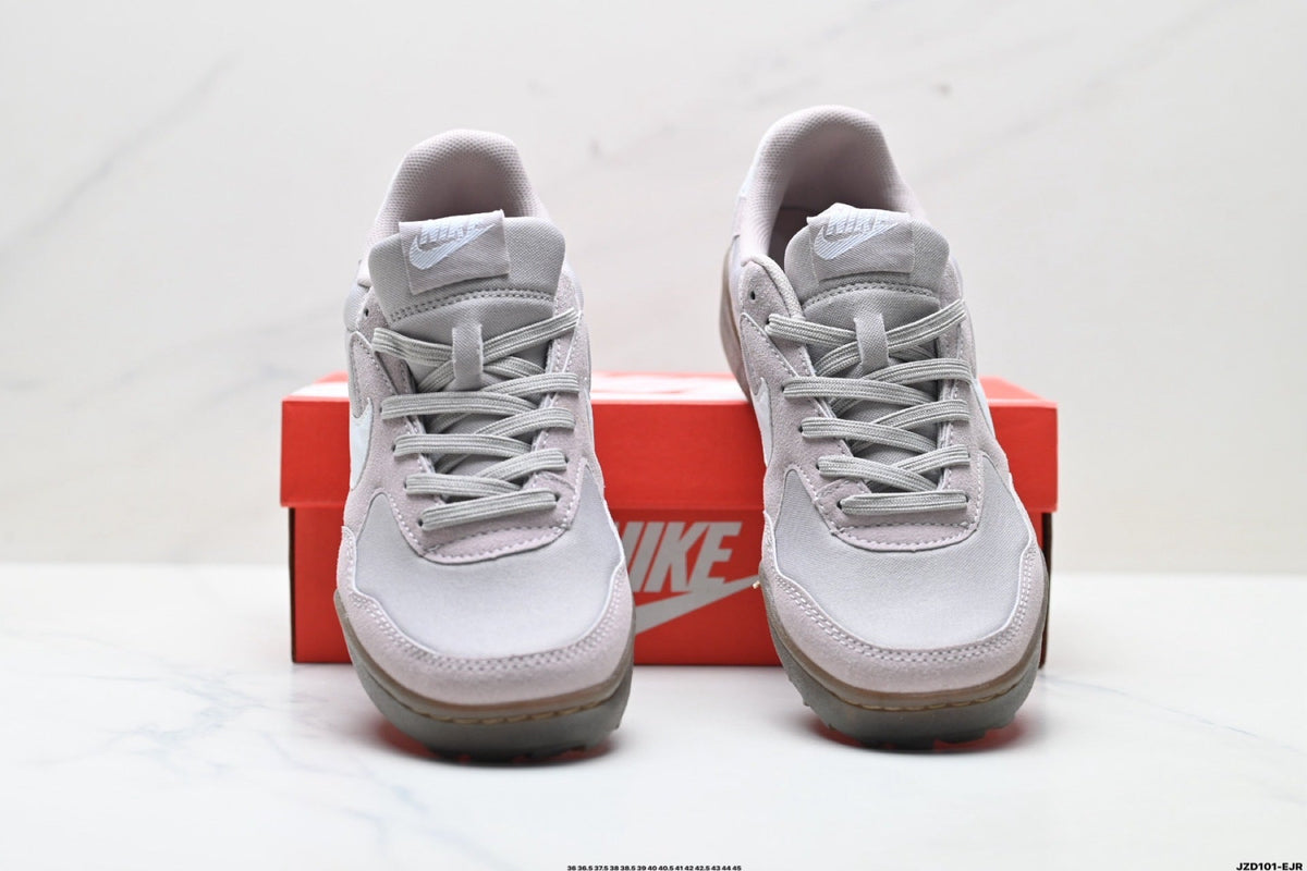 Grey and White Nike Terra Manta Sneakers - product image from the listing.