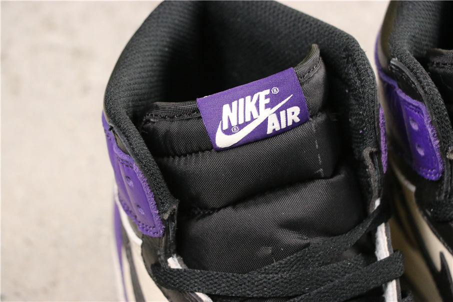 Air Jordan 1 Retro High OG Court Sneakers in Purple 555088-501 - product image from the listing.