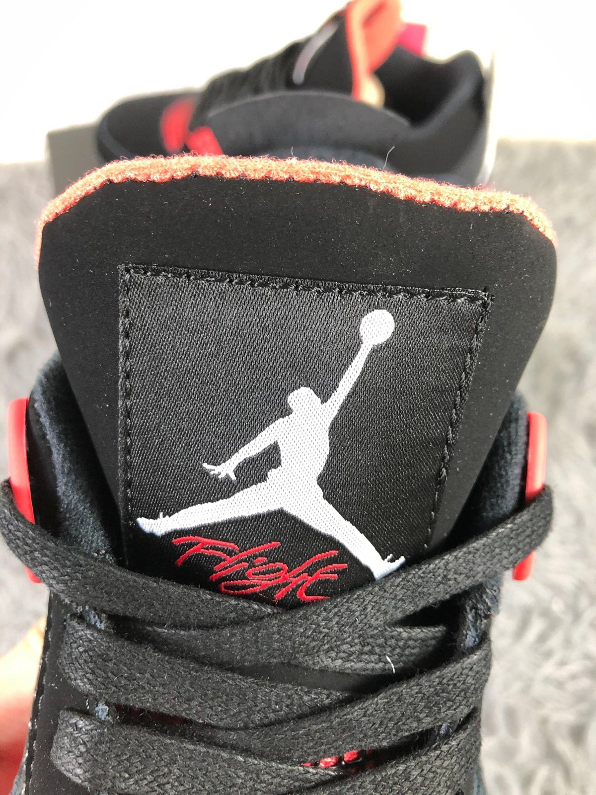 Air Jordan 4 Tattoo Black Red Sneakers CT8527-016 - product image from the listing.