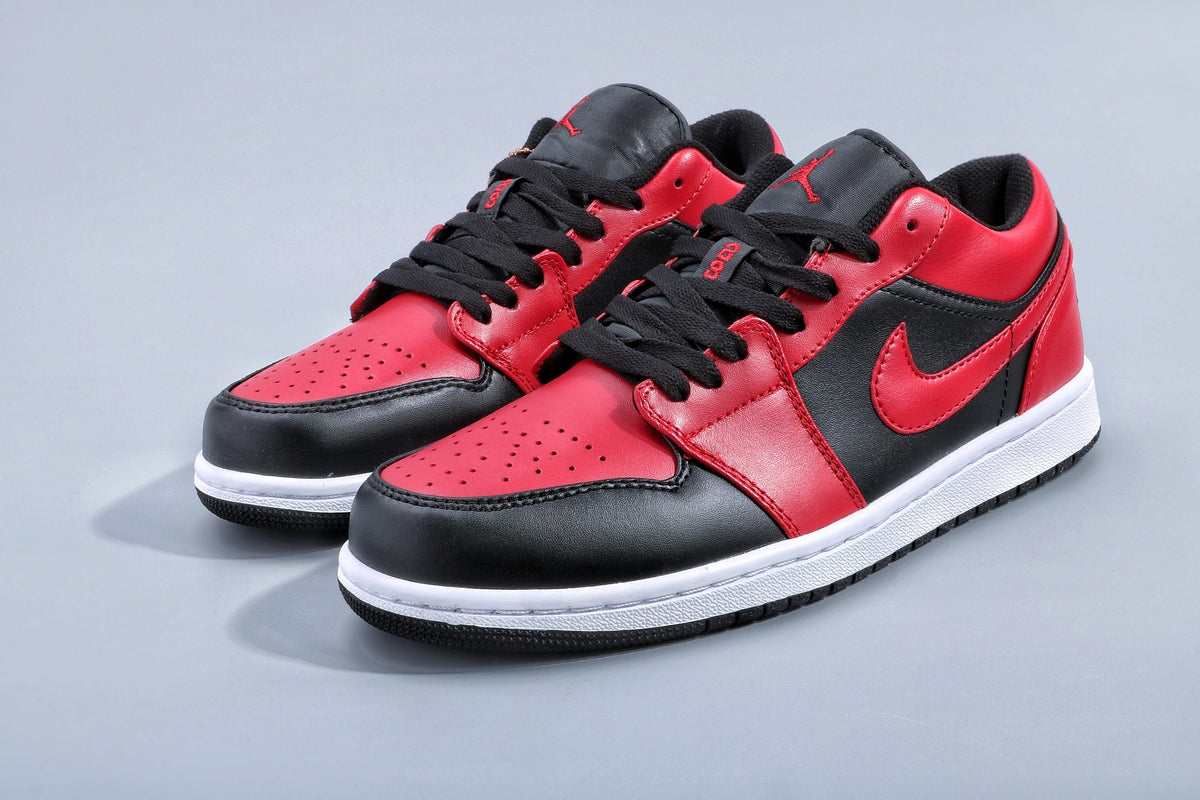 Jordan 1 Low Sneakers in Black Red White - product image from the listing.