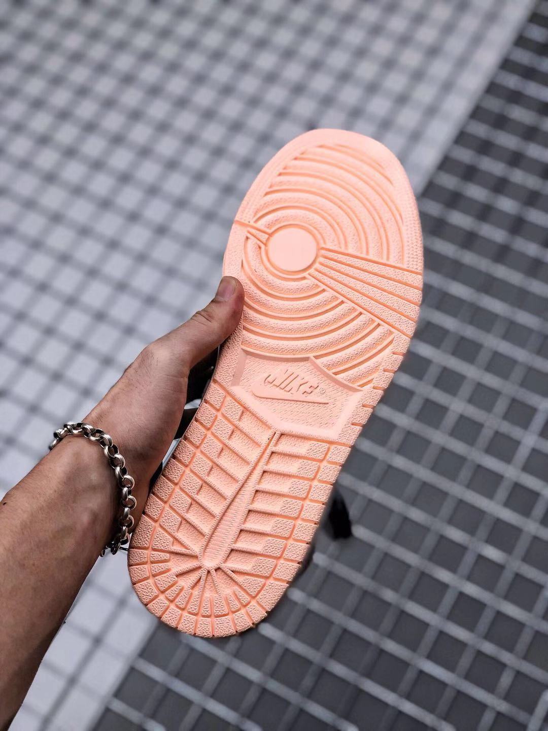 Air Jordan 1 High OG Crimson Tint Sneakers in Black Pink - product image from the listing.