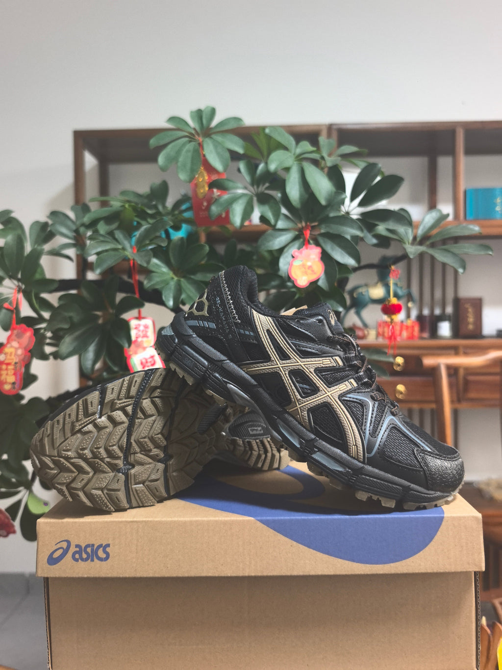 Black and Brown ASICS Gel-Kahana 8 Sneakers - product image from the listing.