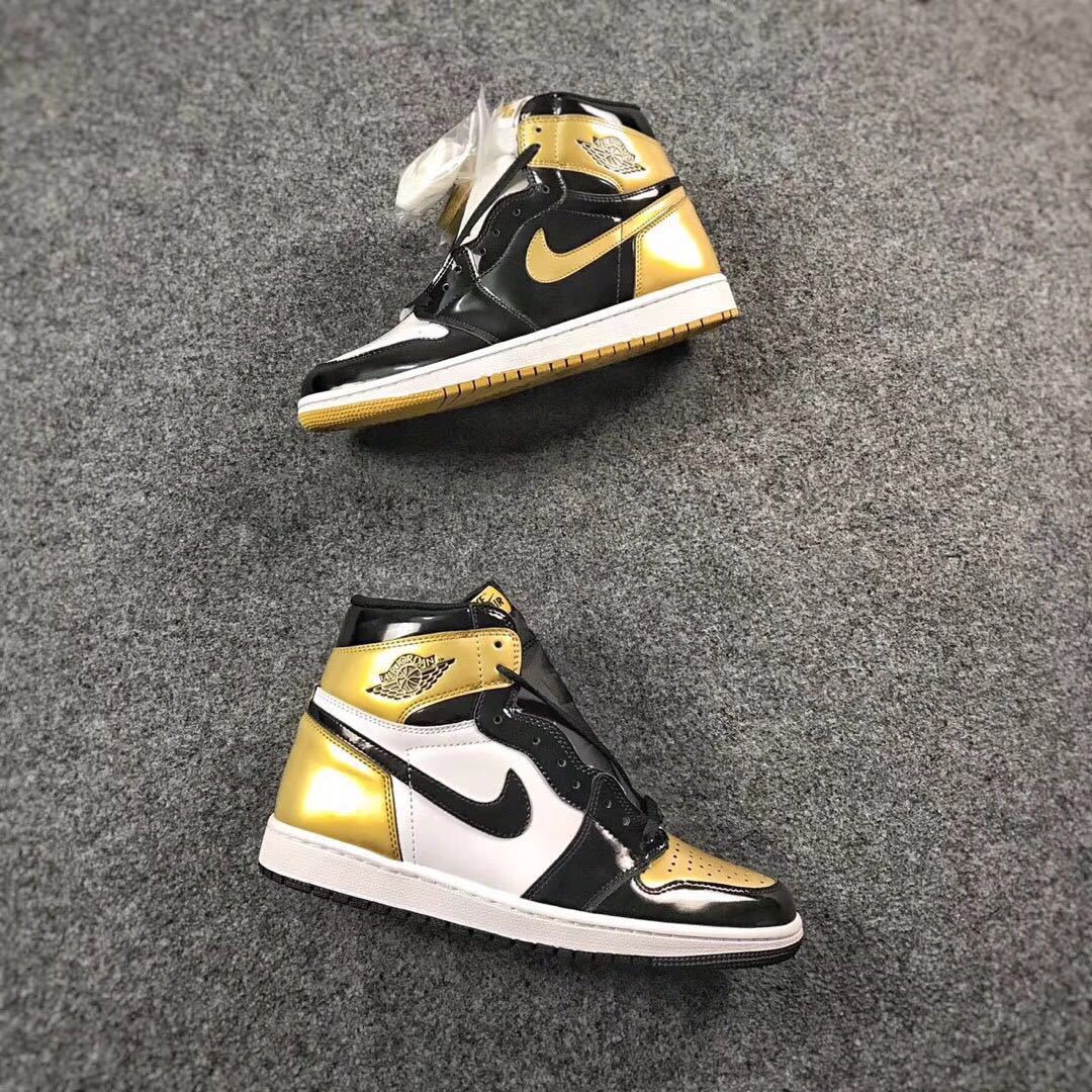 Jordan 1 High Mismatched Sneakers in Black Gold White - product image from the listing.