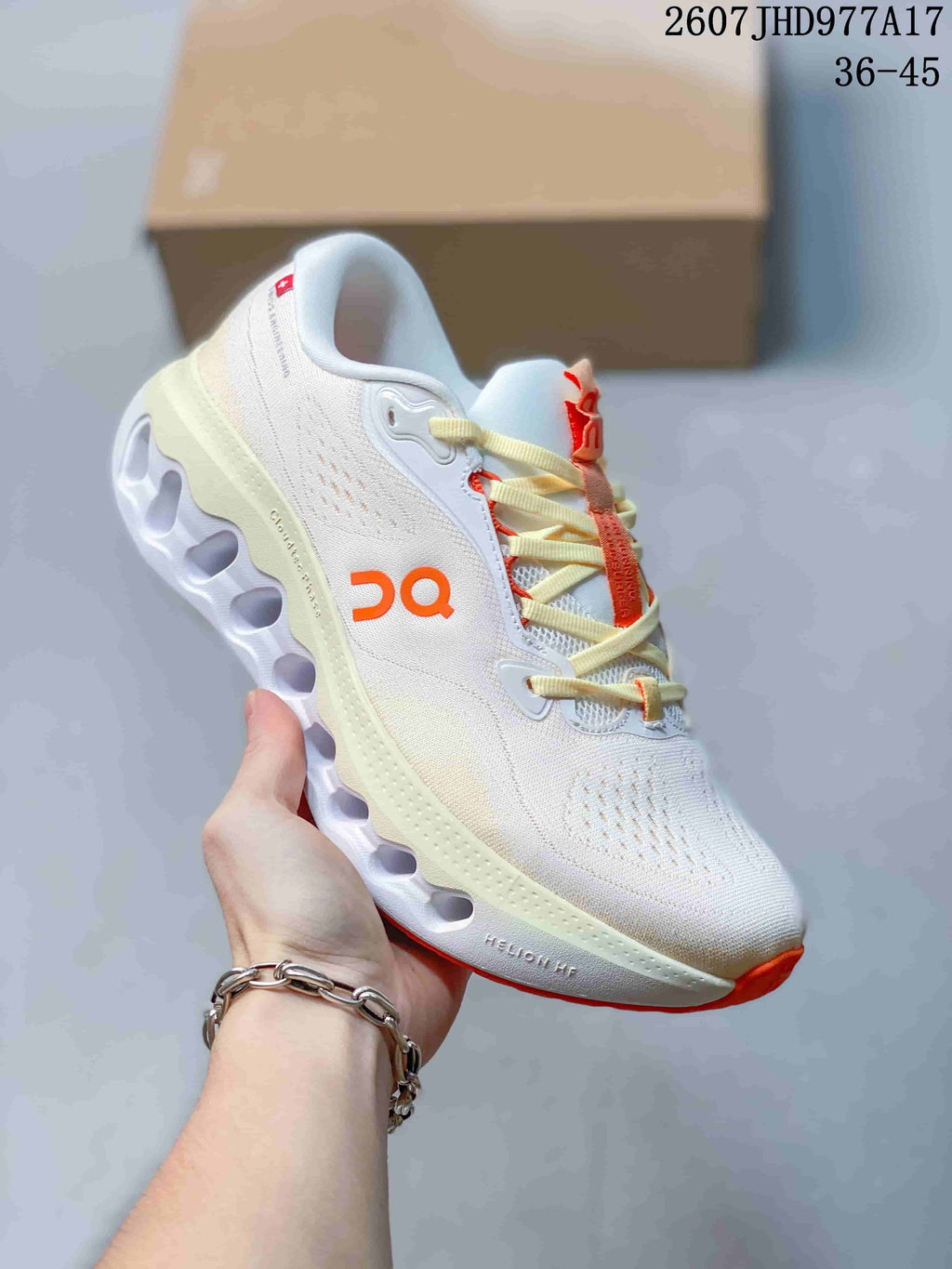 On Cloudtilt Trainers White with Purple or Orange Accents - product image from the listing.