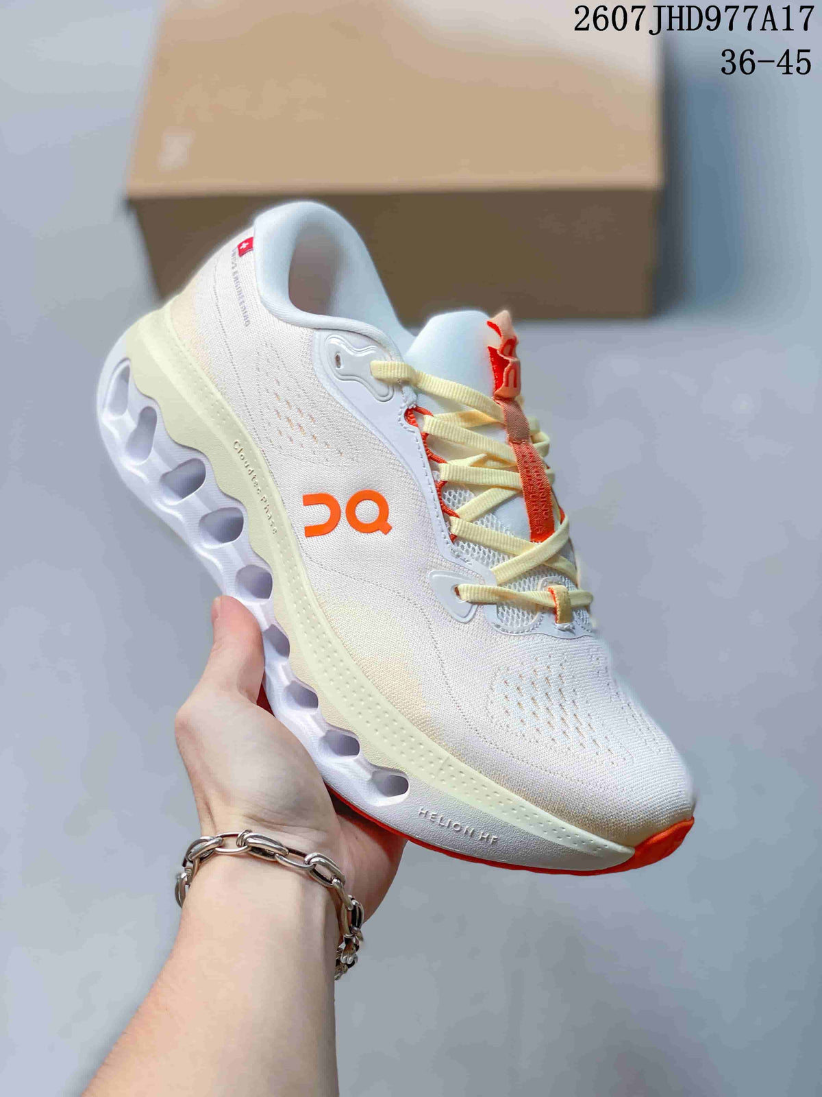 On Cloudtilt Trainers White with Purple or Orange Accents - product image from the listing.