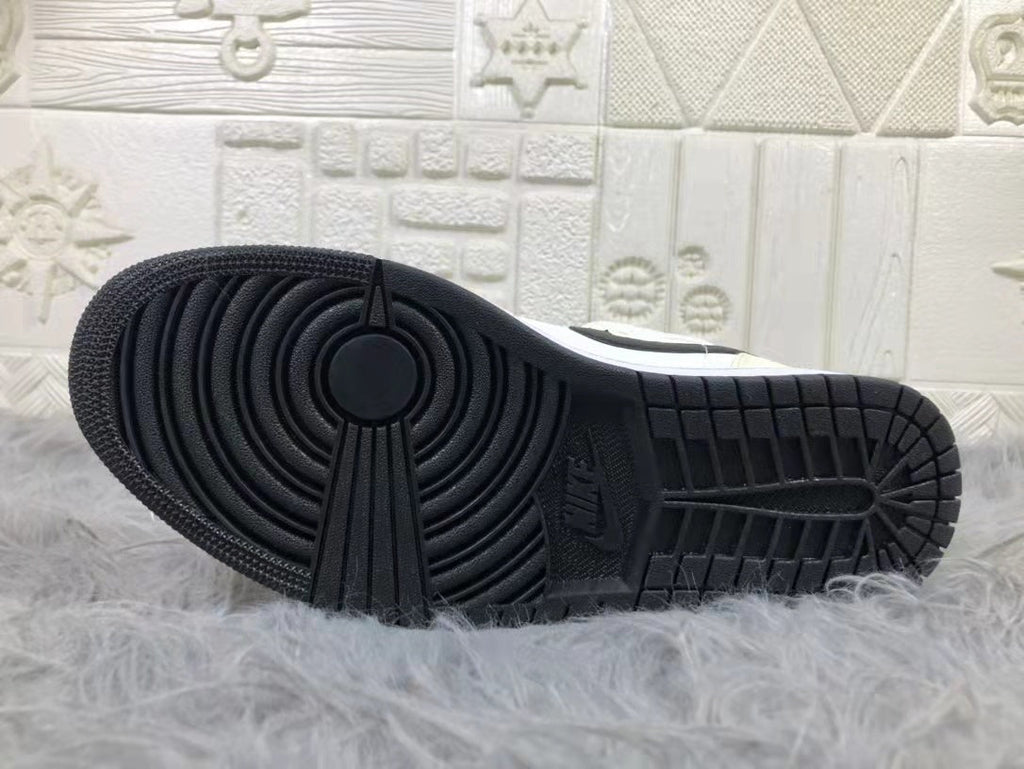 Jordan Air 1 Mid Sneakers in Cream White and Black - product image from the listing.
