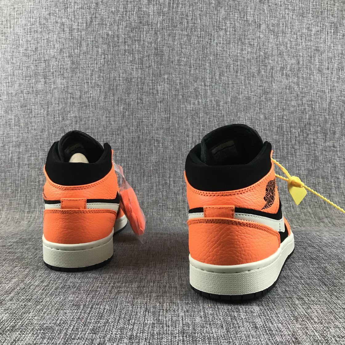 Air Jordan 1 Mid Shattered Backboard Sneakers, in Black and Orange - product image from the listing.