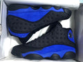 Jordan 13 Retro Sneakers Black/Royal in Blue - product image from the listing.