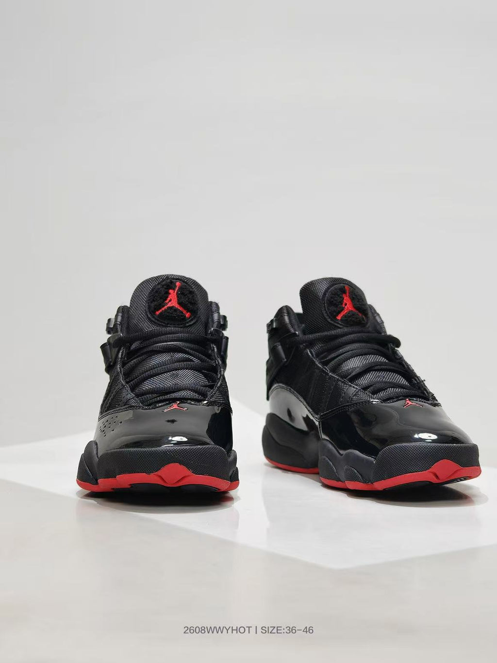 Jordan 6 Rings High-Top Sneakers in Black Red - product image from the listing.