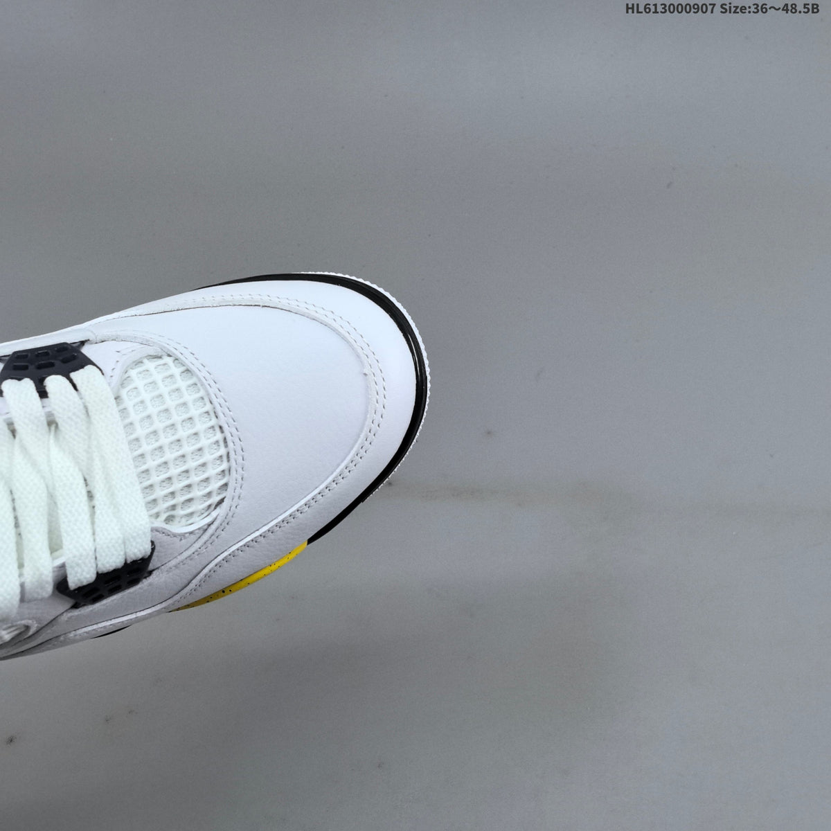 Air Jordan 4 Retro White Yellow Black Sneakers - product image from the listing.