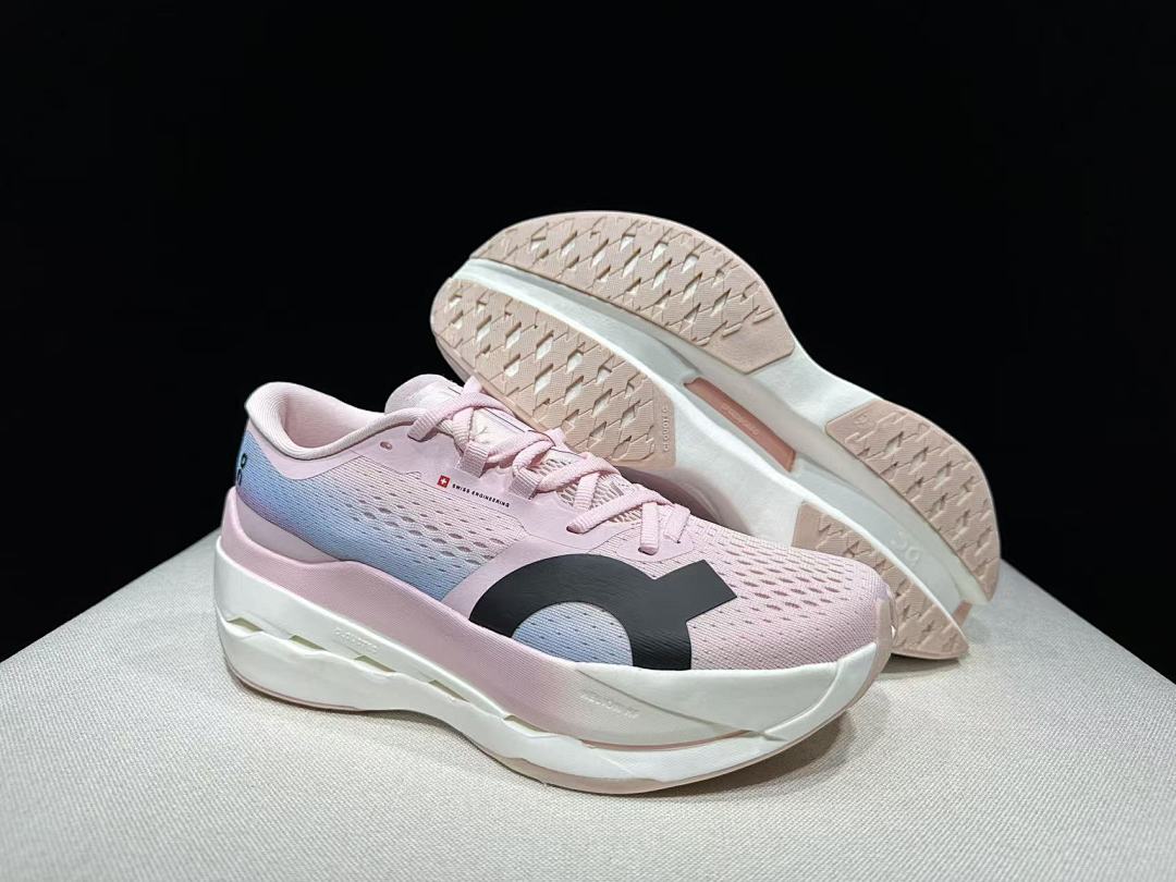 Pink and Blue On Cloudboom Max Running Shoes - product image from the listing.