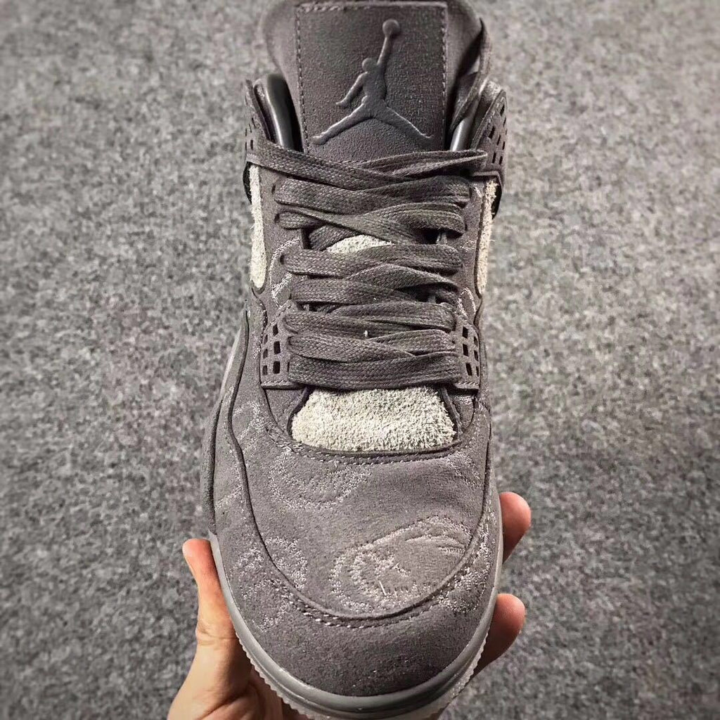 Grey Jordan 4 KAWS Sample High-Top Sneakers - product image from the listing.