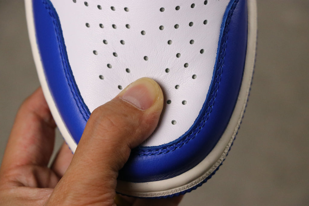 Air Jordan 1 High Game Royal Sneakers 555088-403 - product image from the listing.