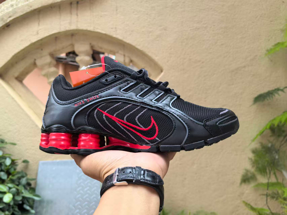 Nike Shox R4 Sneakers in Black and Red - product image from the listing.