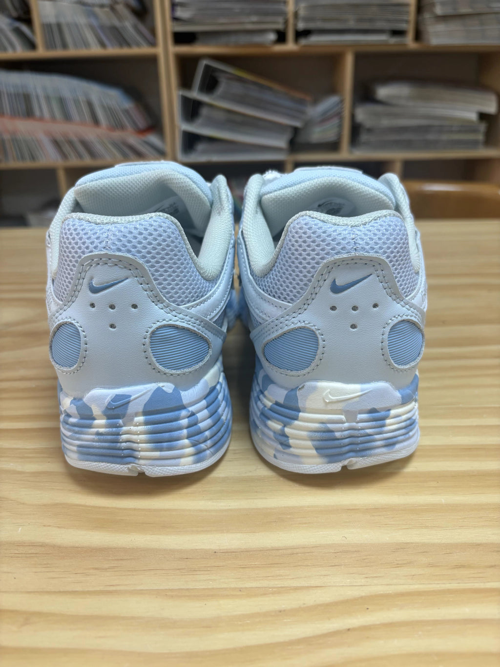 Nike P-6000 Sneakers in White and Blue CV2209-111 - product image from the listing.