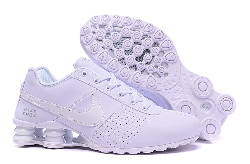 Nike Shox Deliver Trainers in Multiple Colorways - product image from the listing.