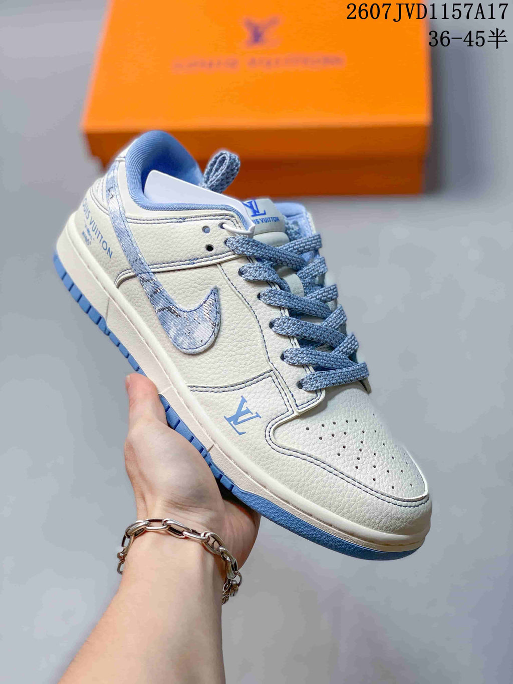 Louis Vuitton x Nike Dunk Low Sneakers in Blue Denim 2607JVD1157A17 - product image from the listing.