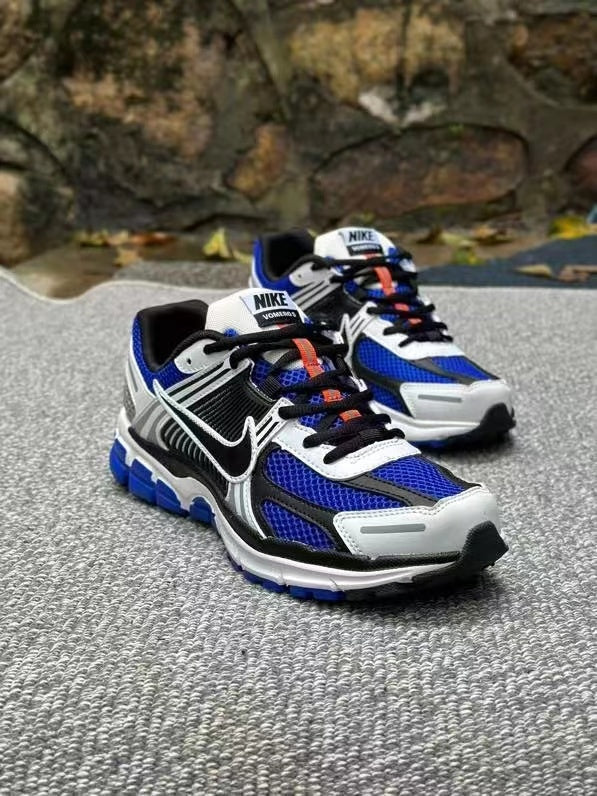 Nike Zoom Vomero 5 Sneakers in Black White Blue - product image from the listing.