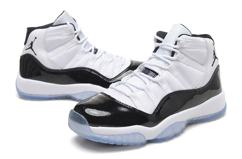 Air Jordan 11 Retro High White and Black Sneakers - product image from the listing.