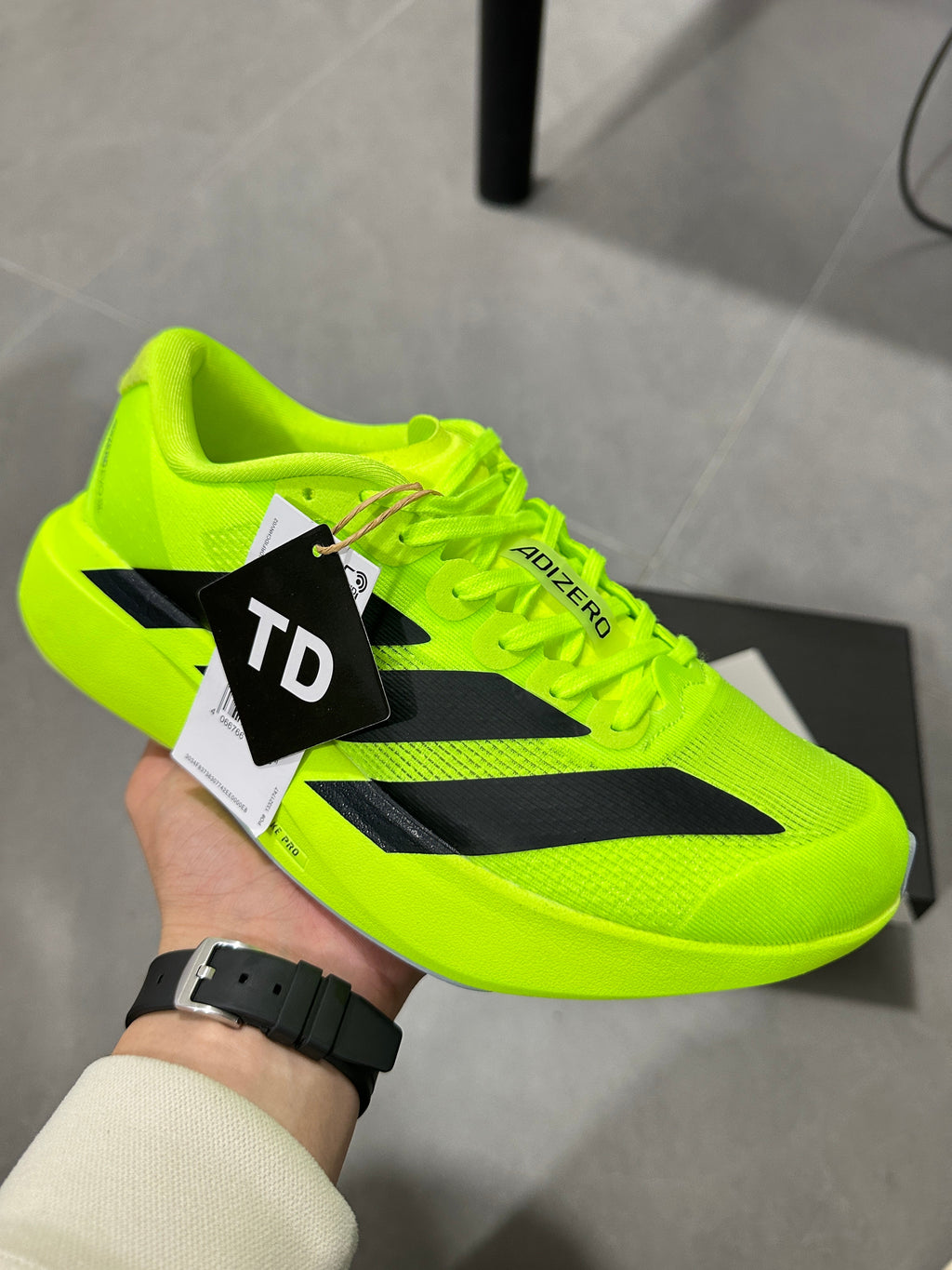 Adidas Adizero Lightstrike Pro Running Shoes, Neon in Green - product image from the listing.