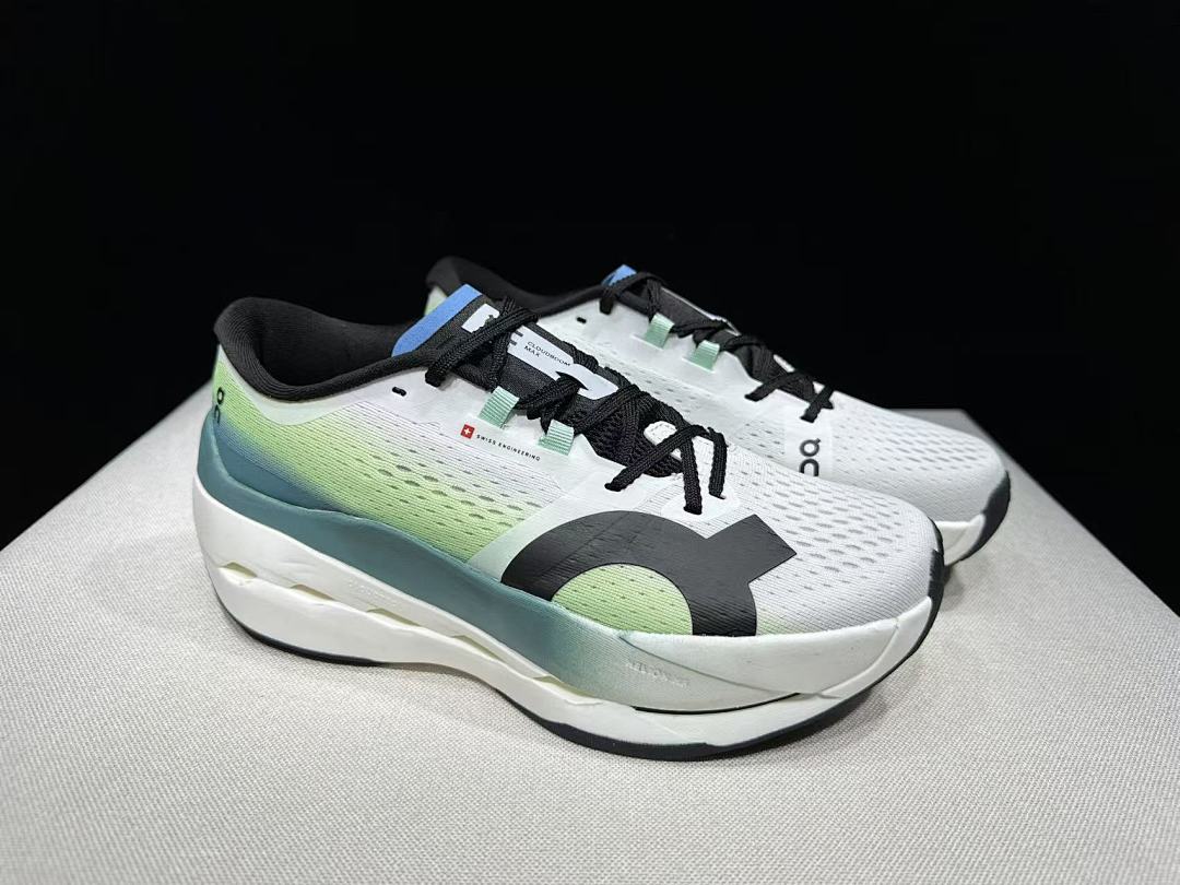 On Cloudboom Max Running Shoes, in White and Green - product image from the listing.
