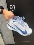 Nike Vaporfly Next% 4 Road Racing Shoes, in White and Blue HF6414-001 - product image from the listing.