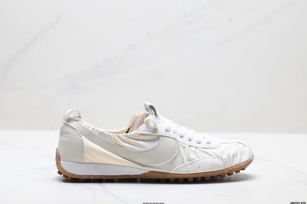 White Jacquemus x Nike Jacumoon Sneakers - product image from the listing.