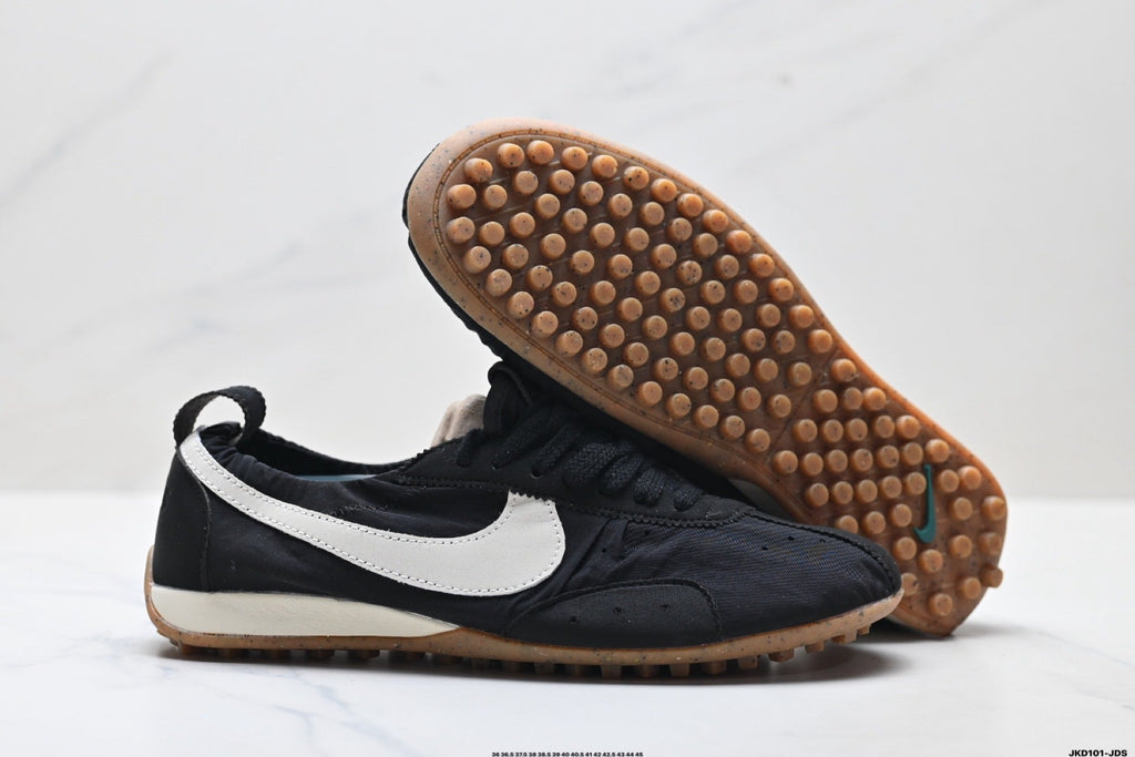 Jacquemus x Nike Jacumoon Sneakers in Black and White - product image from the listing.