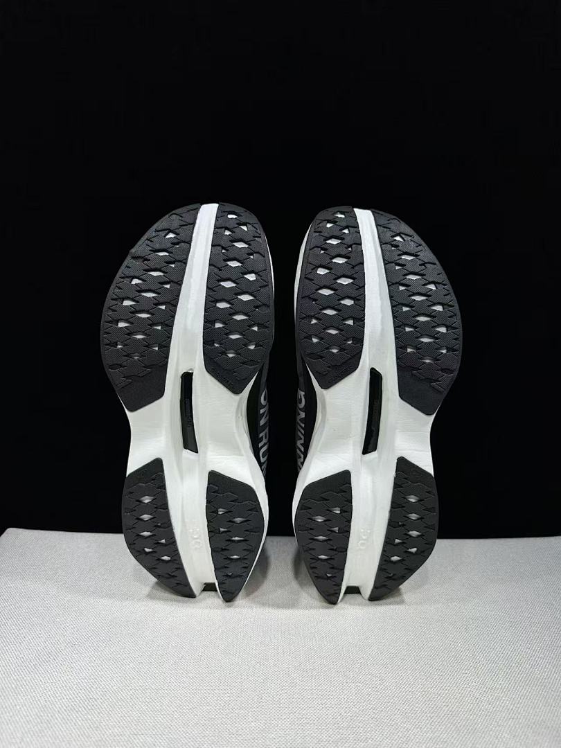 On Cloudboom Max Running Shoes, in White and Black - product image from the listing.