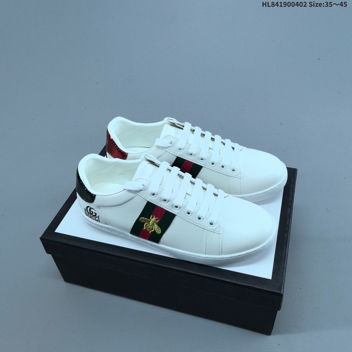 Gucci White Low-Cut Sneakers with Logo Webbing - product image from the listing.