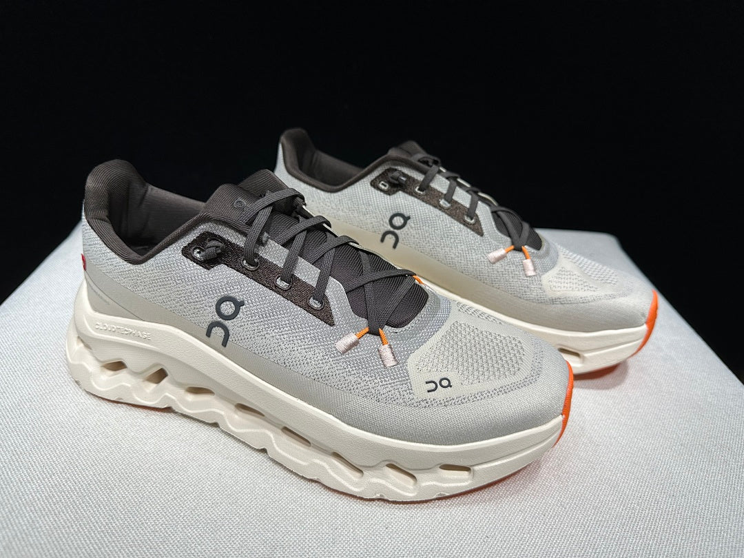 On Cloudtilt Trainers in Gray and Apricot - product image from the listing.