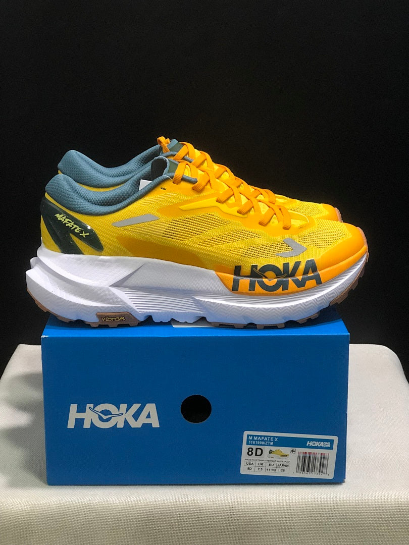 Yellow HOKA Mafate X Trail Running Shoes - product image from the listing.