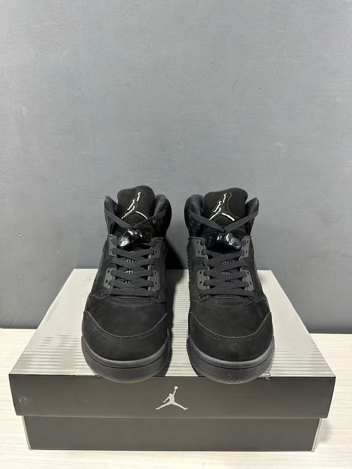 Air Jordan 5 Retro Sneakers Black and Red - product image from the listing.