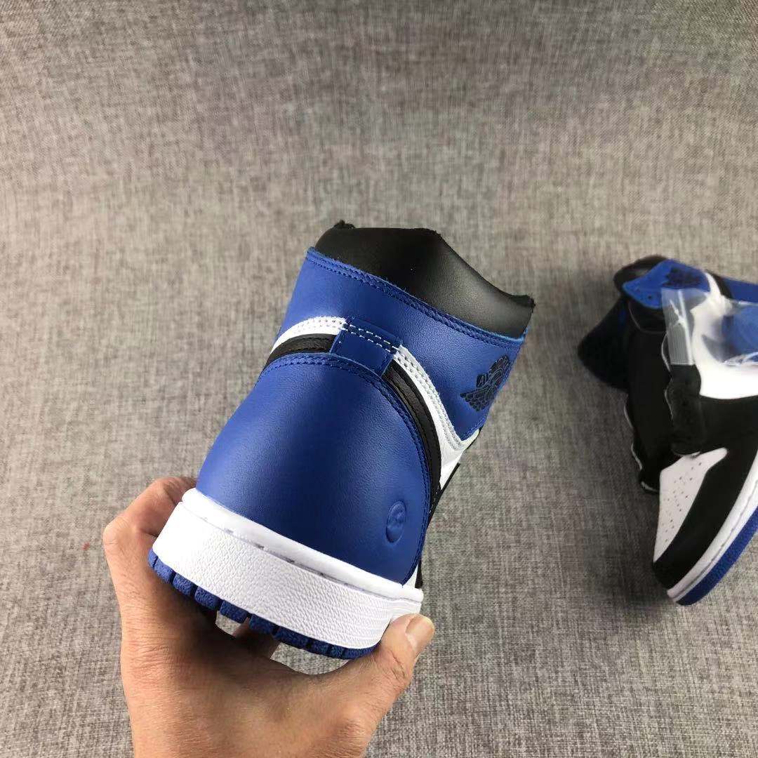Jordan 1 Retro Fragment Sneakers in Black White Blue 716371-040 - product image from the listing.