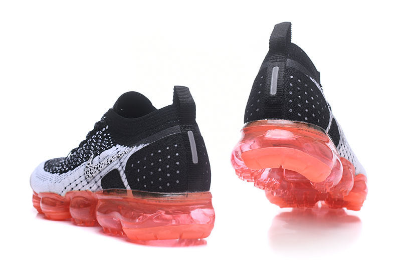 Nike Air VaporMax Flyknit 2 Sneakers in Black White Orange - product image from the listing.